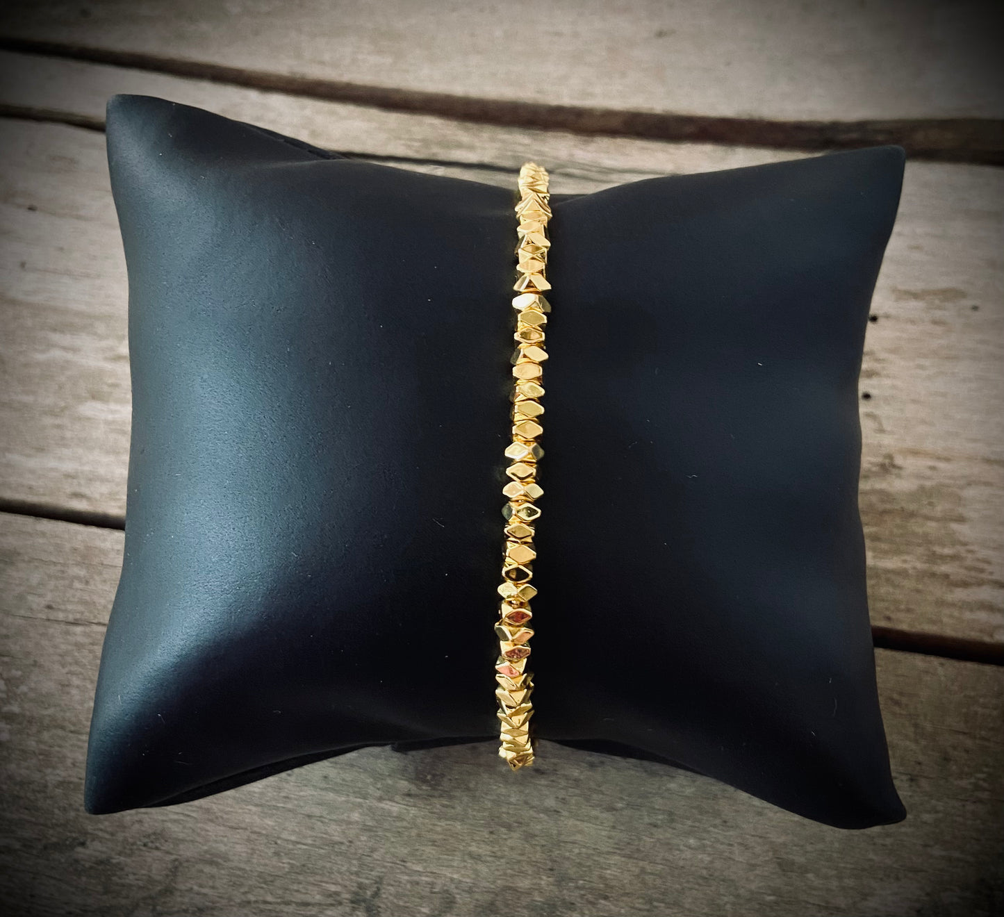 Justerbart metalarmbånd