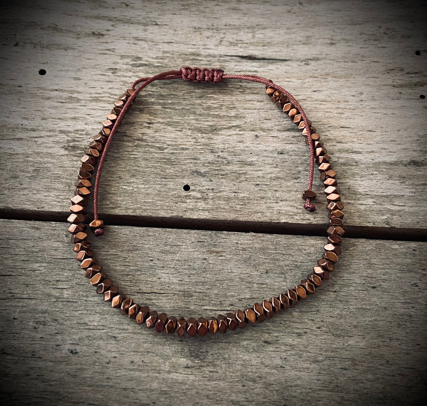 Justerbart metalarmbånd