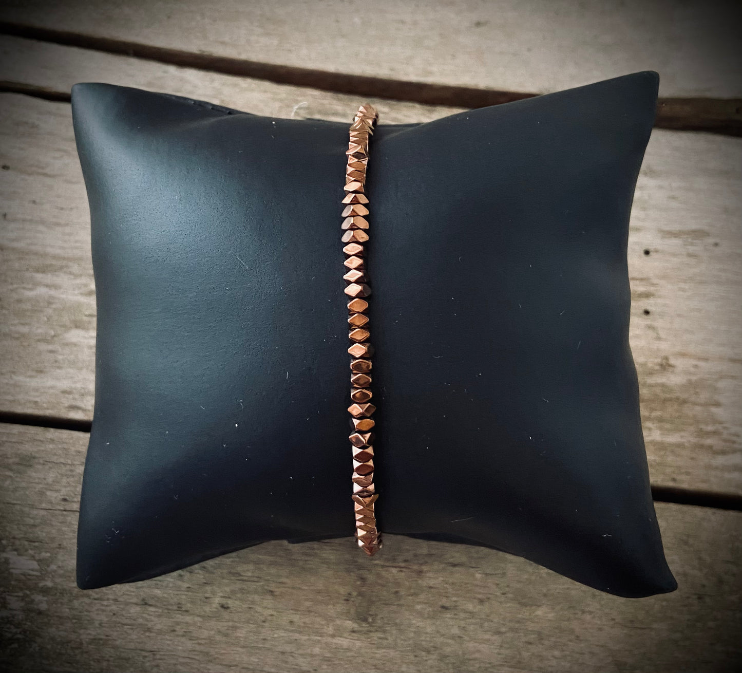 Justerbart metalarmbånd